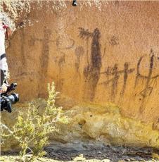 Cameraman Grant Kauffman shoots pictographs during the filming of Expedition: Tales of the Big Bend. Photo courtesy of Wild Yeti Films