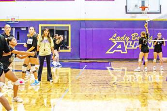 The Lady Bucks volleyball team is pictured spending time working on fundamentals in preparation for each game. Photo by Kara Gerbert