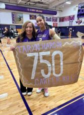 Recently, senior Taryn Hardin celebrated her milestone of 750 kills in volleyball with her Coach, Linda Morris prior to wrapping up district play. Courtesy photo