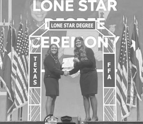 Wiggins receives award