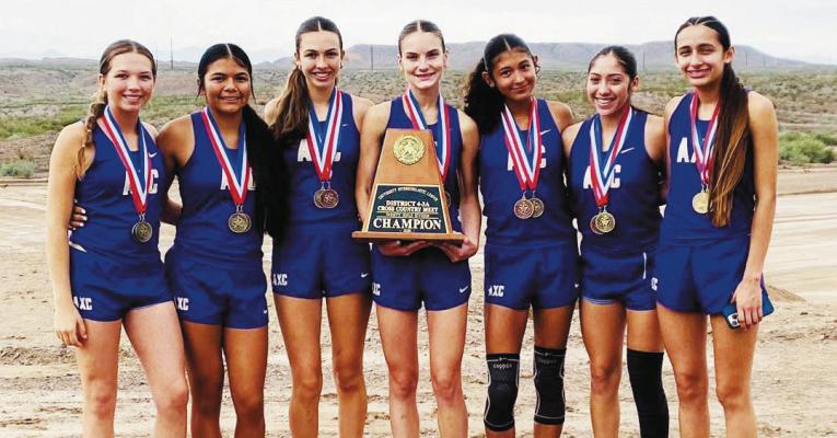 The Alpine Lady Buck cross-country team took the 4-3A District Championship in Presidio last week, with these seven young ladies all placing in the top 10. From left: Hallie Wood (2nd), Zoe Munoz (5th), Alice Saunders (10th), Molly Garrett (6th), Iliana Dominguez (8th), Andynne Ramirez (4th), and Eivary Mercado (1st). Courtesy Photo