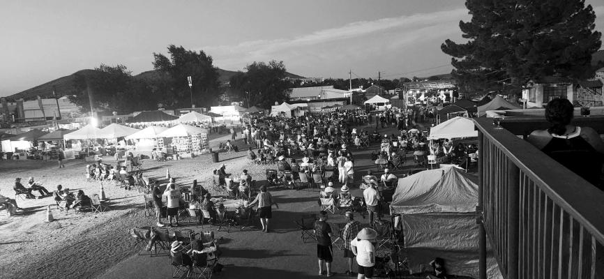 The crowds were just beginning to settle in, in preparation for the night full of music during Saturday’s Fiesta 1888 celebration. Photo by Joh Covington