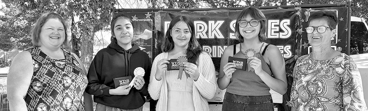 City Manager Megan Antrim and Councilor Judy Stokes, Ward 1, awarded high school artists for their Earth Day artwork to be included in a Dark Skies Coloring Book. Pictured are City Manager, Megan Antrim, Virginia Acosta-Honorable Mention, Lindsey Valenzuela-First Place, Madison Mendoza-Second Place, and Ward 1 Councilor, Judy Stokes. Not pictured are Third Place recipient Jackson Homrighaus, and Guillermo Busy-Honorable Mention. Photo by Kara Gerbert