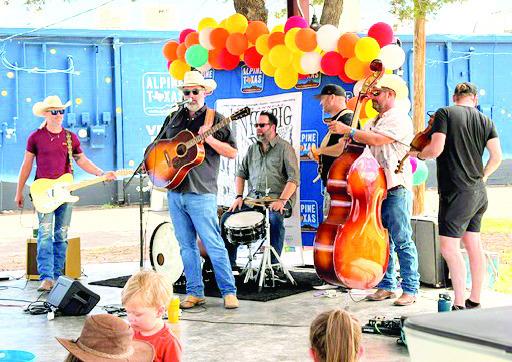 Will Dupuy and his bandmates kept the kids entertained at the Mr. Will show held at the Alpine Visitor Center this past Saturday. Photo by Abigail Scott