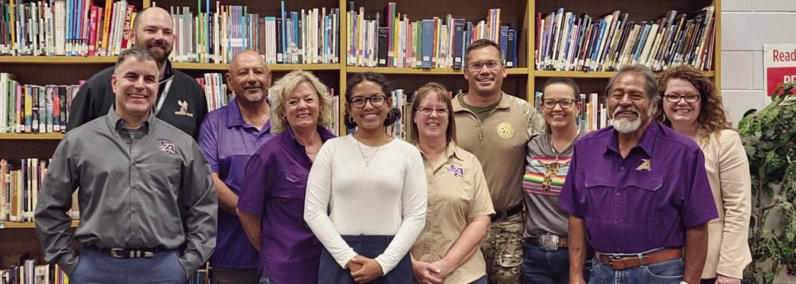 Roxell Adams is the recipient of this year’s Alpine ISD Board Scholarship. Adams (front center) is pictured here with Dr. Adrian Billings, AHS principal Jarrett Vickers, board members Joe Portillo, Mary McCallister, Niki Ahrens, Jimmy Morris, Haley Babb, Eddie Natera, and superintendent Dr. Michelle Rinehart.