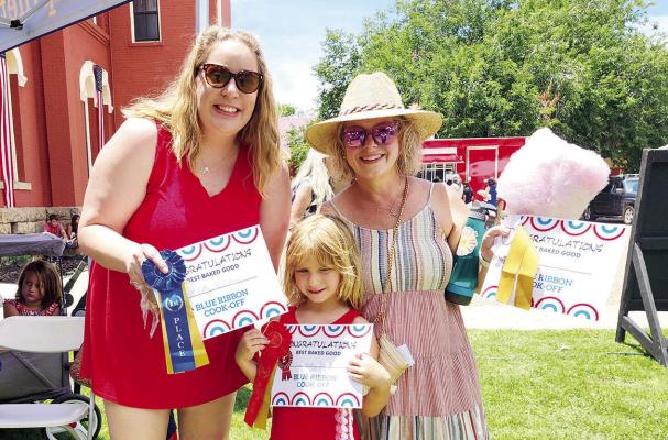 Katy Williams, Cassidy Jacob, and Betsy Zumwalt pose with their ribbons and certificates for their wins in Alpine’s first-ever Blue-Ribbon Cook-Off. Photos by Kara Gerbert