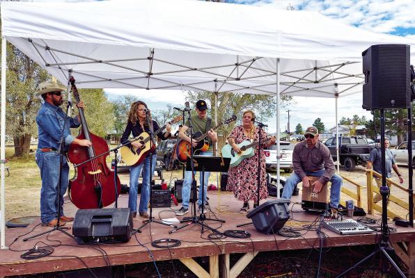 Local band The Swifts, showcased their exceptional talents on more than one stage during this year’s Artwalk event. They are pictured here on the Texas Music Mural stage and members are Neil Trammell, Amelie Urbanczyk, Chris Ruggia, Eden Hinshaw, and Tony Curry. Photo by Kara Gerbert
