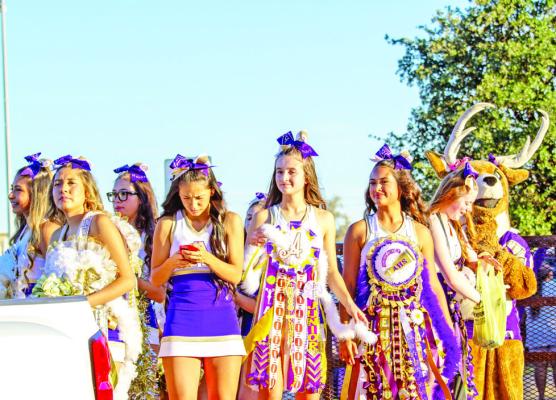 No parade or pep rally would be complete without the AHS cheerleaders. These ladies were ready to put on a show for spectators at Wednesday night’s bonfire. Photo by Kara Gerbert
