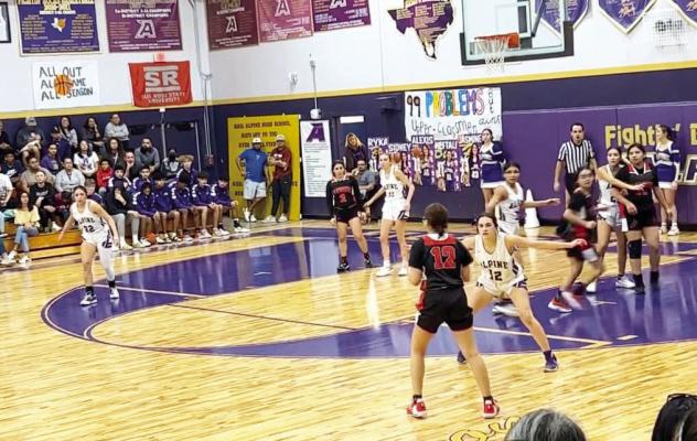 Alpine Lady Buck Alexis Rodriguez defends against a Tornillo Lady Coyote in last Friday’s game. Courtesy photo