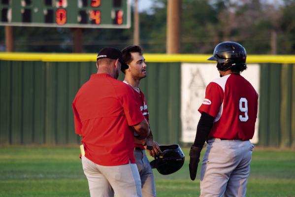 Alpine Cowboys Manager Lance Myers meets up with A.J. Folds and John Tuttle in Roswell to discuss strategy. Photo by Julie Myers.