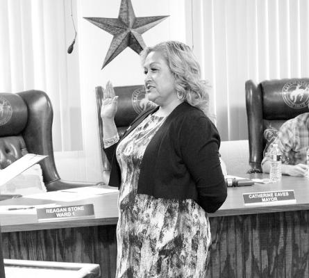 The new city council member for Ward 2, Eva Olivas, was sworn in last Tuesday evening. Photo by Joh Covington