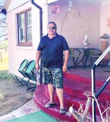 Saul Garza, at his grandmother’s house on the Southside, hopes friends and neighbors will share memories and stories of growing up in the Southside as part of a project he and the Alpine Historical Association are working on. Photo by Shawna Graves