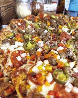 The “Special” pizza is one of the many combinations available for lunch or dinner at Rendezvous. Photo by J.T. Maroney