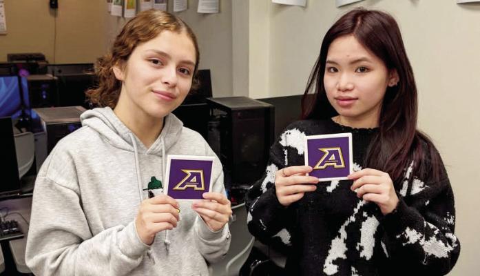 Adobe Certified Professionals Nancy Velez and Mary Do work on dye-sublimation coasters in their Graphic Design II class at Alpine High School. Students enrolled in Mr. Vaughn Grisham’s classes can be Adobe Certified before they graduate, giving them a leg up on the competition in terms of entering the workforce. Courtesy photo