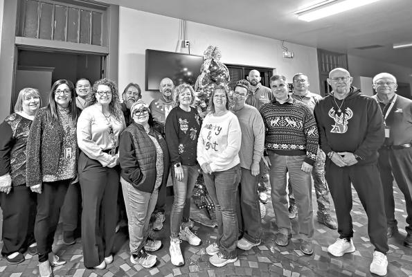 Alpine ISD school administration, principals, and school board members include: back row: Marsha Roach, Chris Valenzuela, Eddie Natera, Joe Portillo, Jarrett Vickers, Jimmy Morris, and Curtis Wubbena.In front are Caroline Fox, Michelle Rinehart, Judith Pardo-Alferez, Mary McCallister, Nikki Ahrens, Haley Babb, Adrian Billings, and Coach Christopher Virdell. Photo by Kara Gerbert