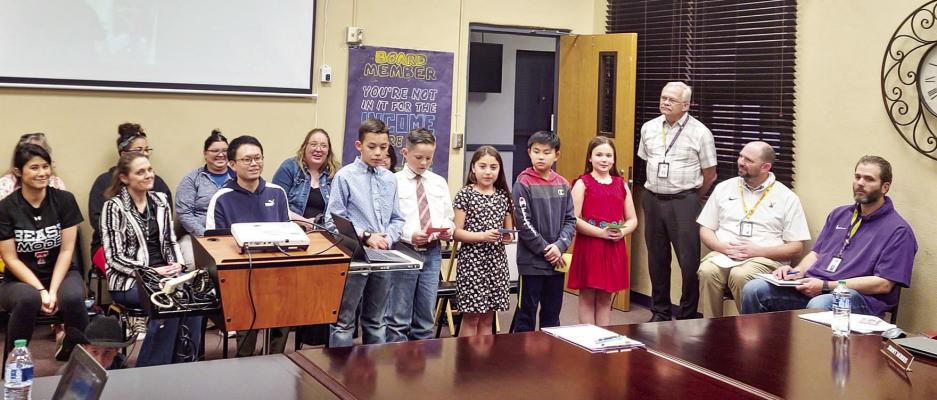 Mrs. Herring’s Alpine Elementary fourth-grade class presented the Alpine ISD Board of Trustees with lettuce that they grew in their classroom using the Flex Farm hydroponics growing system. Photo by Kara Gerbert