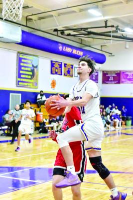 During the Buck’s recent home game with Tornillo, player Ferris Daley prepares to shoot the ball. Photo by Felipe Fierro