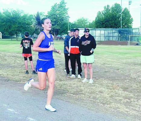 Alpine’s Runnin’ Lady Buck, senior Molly Garrett, earned a topfive spot for Alpine during Saturday morning’s Rick Keith Big Bend Mountain Ramble. Garrett placed 5th out of 49 runners, helping Alpine earn the girls’ varsity championship once again. Courtesy Photo