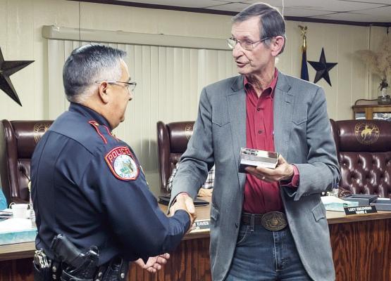 Alpine Police Chief Darrell Losoya was honored Tuesday night with a plaque from Mayor Pro Tem and Ward 5 Councilor Rick Stephens for his 31 years of dedicated service to the City of Alpine and the Alpine Police Department. Avalanche photo