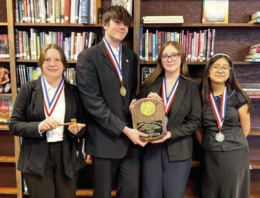 Fort Davis Cross Examination debate students are on their way to the UIL State Debate Tournament after securing District 9A titles last week. Elsa Damm and Doug Cormer received first place, while Abbey Corbin and Miranda Hernandez locked down second place. Damm also received the Top Speaker Award. Photo courtesy of Fort Davis ISD