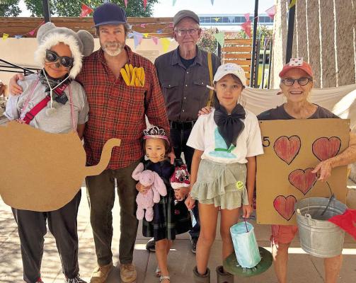 The Marfa Public Library held a Mad Hatter tea party on Saturday, with both kids and adults getting in on the fun, to celebrate Lewis Carroll’s classic Alice in Wonderland. Photo courtesy of Marfa Public Library