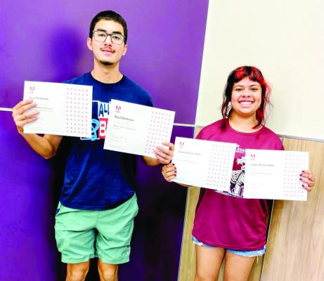 Raul Renteria and Izabel Ortiz recently spent time in Mr. Vaughn Grisham’s classroom re-certifying themselves as Adobe professionals before they take off for San Marcos and Texas State University. Courtesy photo