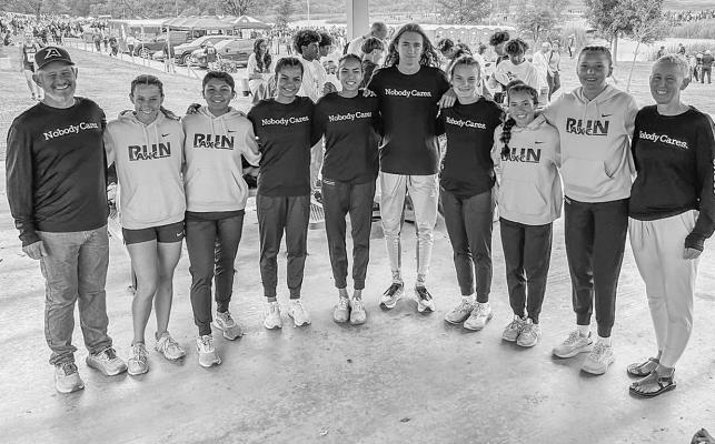 The Alpine Runnin’ Bucks cross-country runners are headed to state after qualifying at this past Saturday’s Regional meet in Lubbock. Pictured are Assistant Coach George Hazlehurst, Tannin Ritchie, Hope Dominguez, Megan Strothers, Emy Hernandez, Hatfield Cason, Molly Garrett, Mia Morris, Colette Fowlkes, and Head Coach Cory Cason.