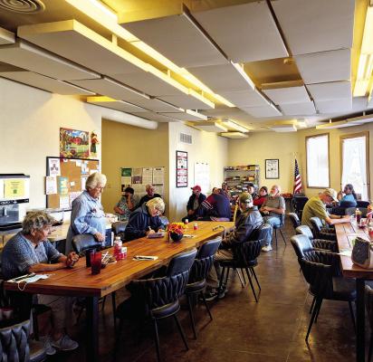 Area senior citizens geared up to celebrate a Thanksgiving meal at the Sunshine House last Tuesday. Photo by Kara Gerbert