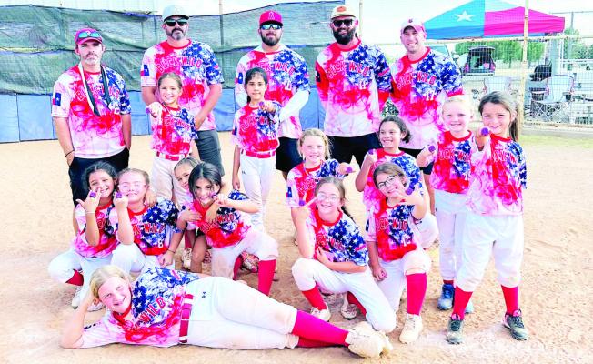 Future Lady Bucks battle it out on the diamond