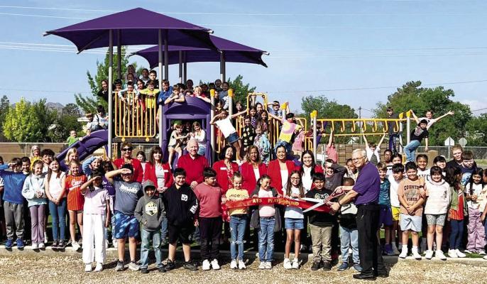 Alpine Elementary School held its final ribbon cutting for the new playgrounds last Thursday. On hand were the Alpine Ambassadors along with AES principal Curtis Wubbena and the third and fourth-grade classes from AES. Courtesy photo
