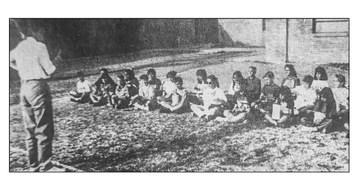 April 14, 1994 Music instructor Johnnie Mae Stice is shown working with Alpine Elementary students as they prepare for the spring musical on Tuesday.