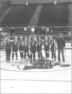 The Marathon Lady Mustangs took home the Bi-District trophy after defeating Van Horn 56-35 in Fort Stockton on Monday. Courtesy photo