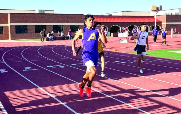 Harlo Vargas pumps his legs as he sprints towards the finish line in last week’s relay race at the Area track meet in Denver City. Photo by J.T. Maroney