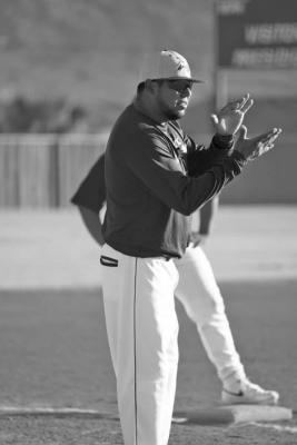 Coach Adam Llanez is pictured encouraging his players as they battle it out on the diamond. Courtesy Photo