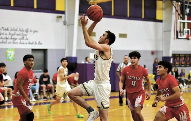 Jake Crump goes up with the ball as the Fightin’ Bucks downed Van Horn at home Tuesday night, 53-45. Photo by Felipe Fierro