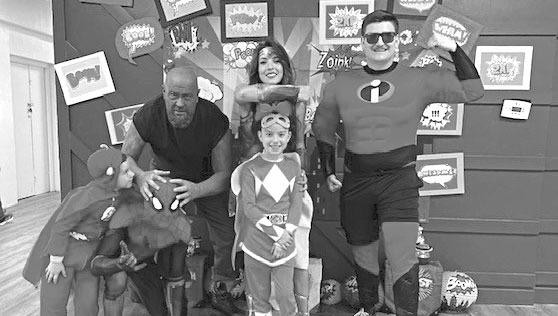 Grace Christian Fellowship held a Back-to-School festival August 6 with a super hero theme. From left is Leroy Morales, Vaughn Williams, Shannon Dawley, Lori Overstreet, Serenity Morales, and Justin Obink. Courtesy photo