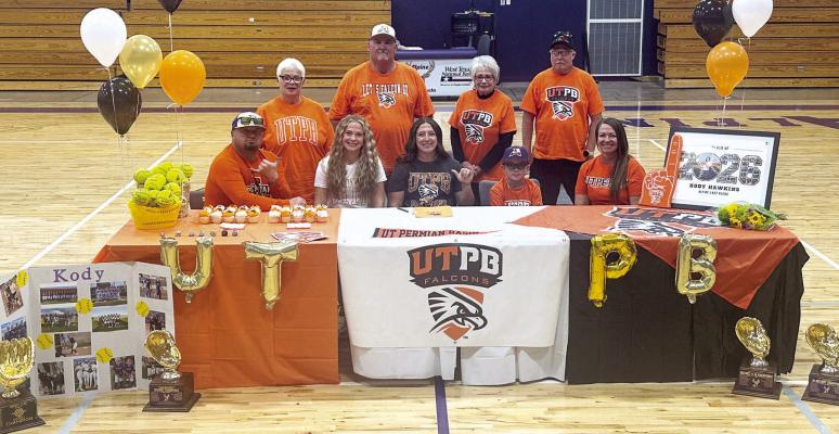 Senior Kody Hawkins signed with the University of Texas Permian Basin last week to become an official Falcon for the 2026-2027 softball season. Hawkins was joined by her family for the signing. From left are dad T.C. Hawkins, great aunt Chachi Hawkins, sister and fellow Lady Buck softball player Kacy Hawkins, granddad Tommy Hawkins, grandmother Debbie Pruitt, brother Trevor, uncle James Poe, and mom Julie Hawkins. Courtesy photo