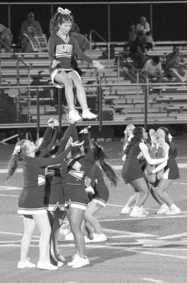 The Alpine Middle School cheerleaders performed routines during half-time at this past Friday’s homecoming game pitting the Alpine Bucks against Compass Academy. Photo by Joh Covington