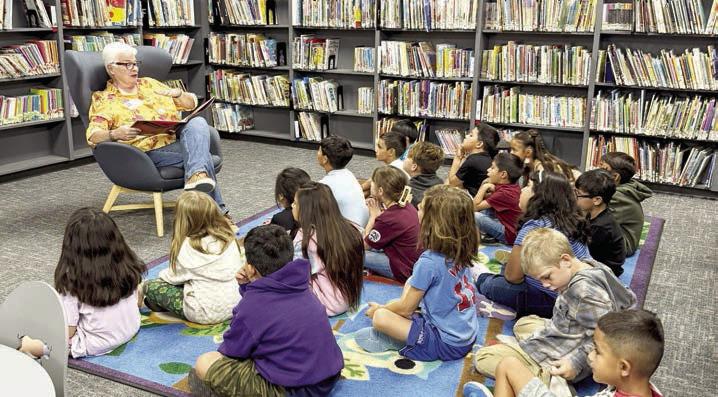 The Read Alpine program is back at Alpine Elementary. Community member Chachi Hawkins took time to read to students in the AES Library last week. Courtesy photo