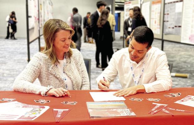 Dr. Andria Rusk, executive director of Public Health at SRSU, and Dr. Carlos A. Faerron Guzman, executive director of Inter-American Center for Global Health (CISG), formalize the agreement between the two organizations. Photo courtesy of Sul Ross