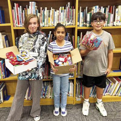 These Alpine Middle School students were the winners of September’s bookmark decorating contest. First place was Marlis Price, second place was Rebekah Solis, and third place was Issac Garza. Courtesy photo