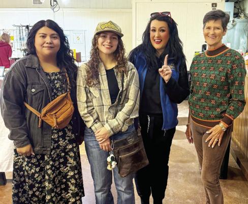 Alpine High School artist Nancy Velez won the Dark Skies art contest last weekend to culminate Dark Skies week. Velez is pictured here with her art teacher, Ariana Vega, HeatherYadon with the City ofAlpine, and art judge Judy Stokes. Courtesy photo