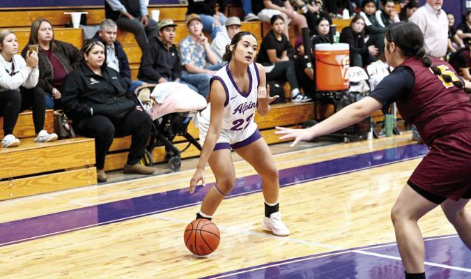 Lady Buck Ailea Fierro motions to a Lady Jacket to ‘bring it on’ in their game against Kermit. Photo by Felipe Fierro