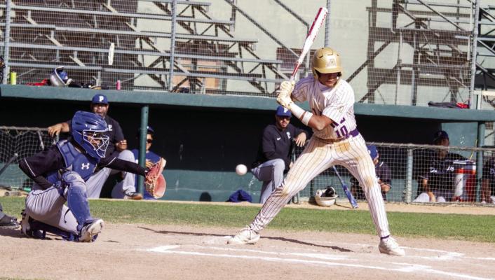 Ezra Lujan has a ball slip past in the strike zone in the Bucks’ previous meeting with the Blue Devils at home. Photo by Kara Gerbert