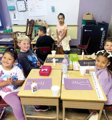 First graders at Alpine Elementary learned how important bones are to the human body and its structure, creating skeletons out of Q-tips, construction paper, and glue.
