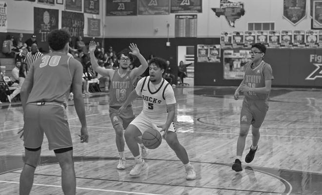 Alec Ramos drives toward the Bucks’ goal through a pack of Wildcats in Tuesday’s win over Anthony. Photo by Felipe Fierro