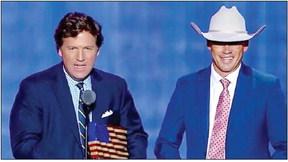 Staff Lt. James Morris of Alpine receives the Heroism award from Tucker Carlson at the Fox Nation Patriot Awards held last Thursday in Hollywood, Florida. Courtesy photo