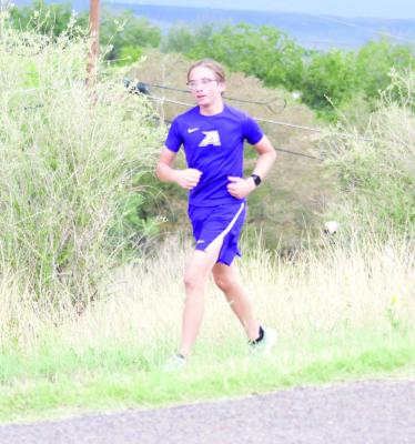 Middle schooler Leo Sutherland keeps up a steady pace during Saturday’s Big Bend Mountain Ramble. Photo by Kara Gerbert