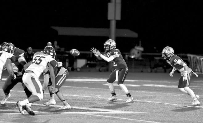 Fightin’ Buck Devon Rojo catches the ball, backed by Logan Smith in the recent game against Crane, who the Bucks will face again November 3.