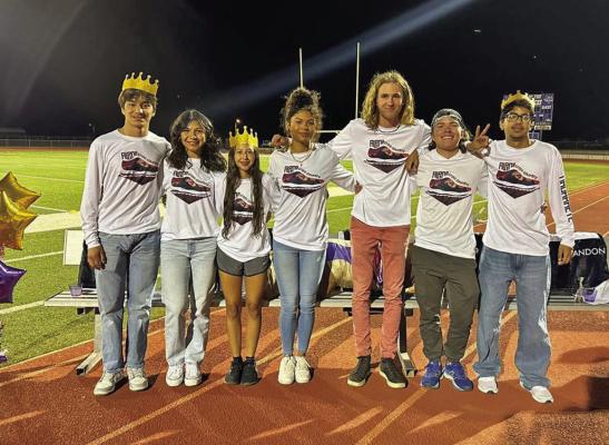Senior cross-country members were celebrated Monday night at Buck Stadium, with each student-athlete speaking to the crowd. Pictured are Solanus Prieto, Hope Dominguez, Jaylynn Celaya, Danica Mulholland, Hatfield Cason, Landon Velasco, and Alan Valenzuela-Navarrete. Courtesy photo